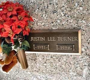 Justin is buried at Summerville Cemetery and Mausoleum on Highway 17A South (also Boone Hill Road) in Summerville.