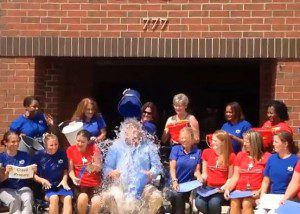 Pictured: Principal Mike Shaw and 22 teachers accept the ALS bucket challenge