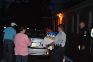 Deputies loading up food to deliver to families on Thanksgiving.