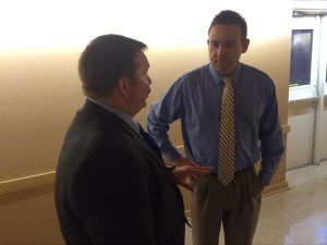 Bonneau Police Chief Fuda talking to GOP Chair Tim Callanan prior to meeting