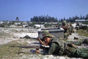 Pictured: Battle of Hamo Village During the Tet Offensive. US Marines and ARVN troops defend a position against enemy attack. (Courtesy: Wikimedia Commons)
