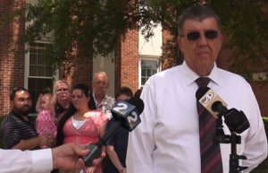 Pictured: Former Hanahan Police Chief Melvin Bellew addresses the media Tuesday outside the Berkeley Co. Courthouse