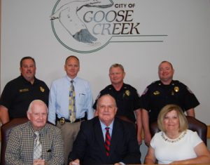 (L to R): Seated – Harold Deese, Mayor Michael J. Heitzler and Mary Ann Deese.  Standing – Captain Dave Soderberg, Captain John Grainger, Chief Harvey Becker and Captain Shawn Laffey