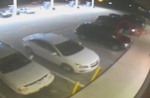 Suspect seen getting into dark SUV before driving off.