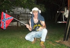 Roof proudly displaying the flag in a separate photo.