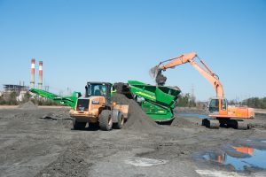 Jefferies fly ash mining, placed in trucks for transportation to giant cement, march 10, 2014