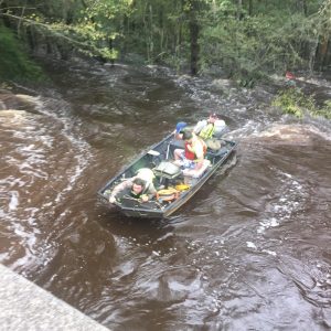 Berkeley Co. Rescue Squad carries kayaker to safety.