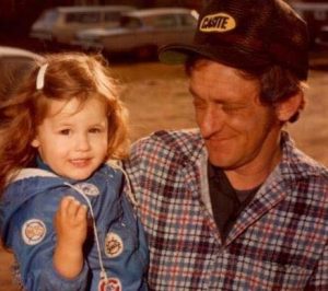 Pictured: Kelly as a child with her father