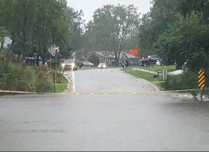 Pictured: Caution tape blocks off Tall Pines Road. (Via Tommy Newell/Facebook)