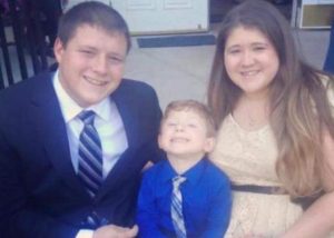 Pictured: Cameron Babson pictured with his wife, Ashley, and their son.