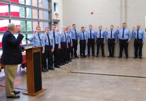 Goose Creek Mayor Michael Heitzler swears in 14 new firefighters at the recent ceremony.