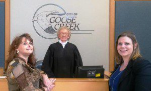 GCHS teacher Amanda Cooper and Clerk of Court Erica Fann are pictured with Judge Johnson during the recent visit. 