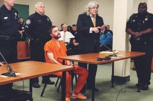 Pictured: Daniel Ward sits and listens as his attorney addresses the court. (Via Lara Rolo/Twitter)