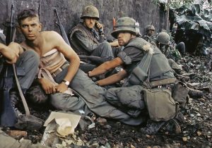 Marine gets his wounds treated during operations in Huế City, 1968 (Via Wikimedia Commons)