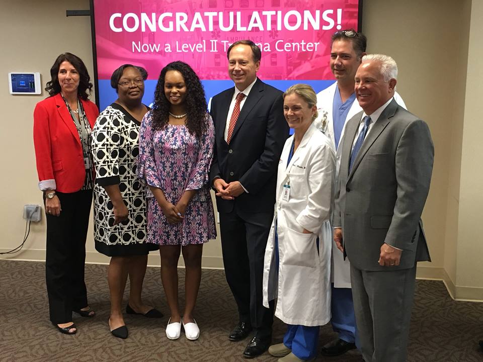 From L to R: Trident Trauma Director Shelby Rivera, RN; Deloise Gist; Berkeley Co.Sheriff's Deputy Kimber Gist; Trident CEO Todd Gallati; Trident Trauma surgeon Stancie Rhodes, MD; Trident Trauma surgeon Will Dutton, MD; and Berkeley County Sheriff S. Duane Lewis.