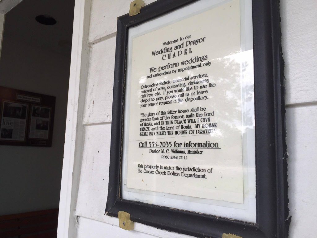 The chapel doors are locked, but people who need somewhere to pray can call for an access code.