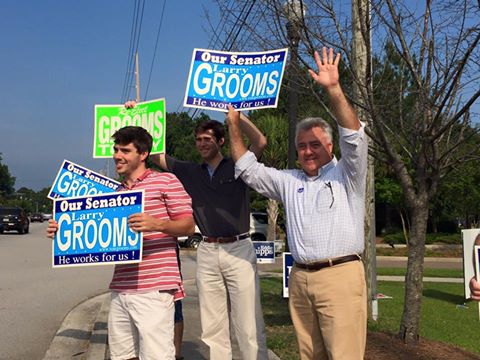 Pictured: Larry Grooms does some last minute campaigning on Tuesday.
