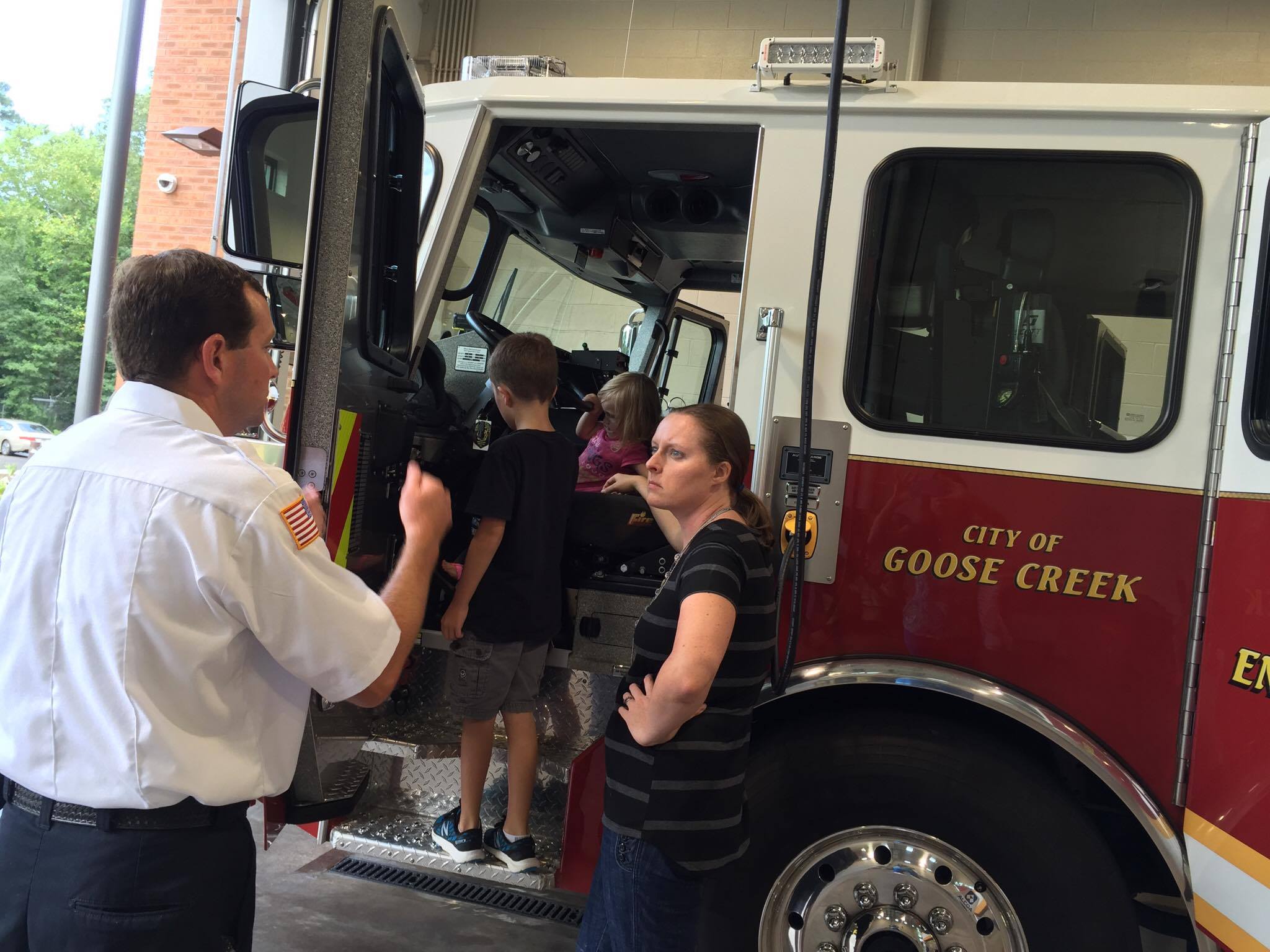 Kids got to check out the fire truck inside.