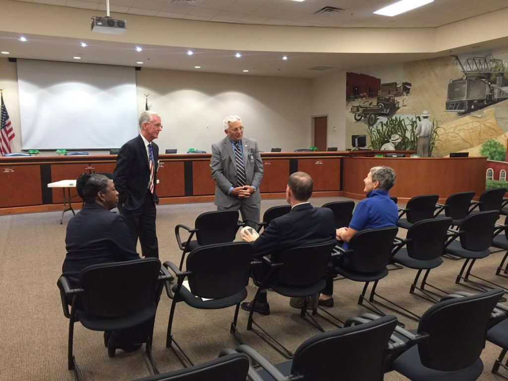 Two CALEA staffers talk to citizens about re-accreditation of the BCSO.