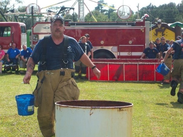 Pictured: Michael Yonke takes part in a local firefighter competition.