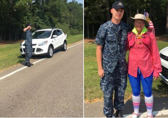 Pictured: A member of the military pulls over on the side of the road to salute Anna as she passes by with her American flag. (Via Anna DeWitt)