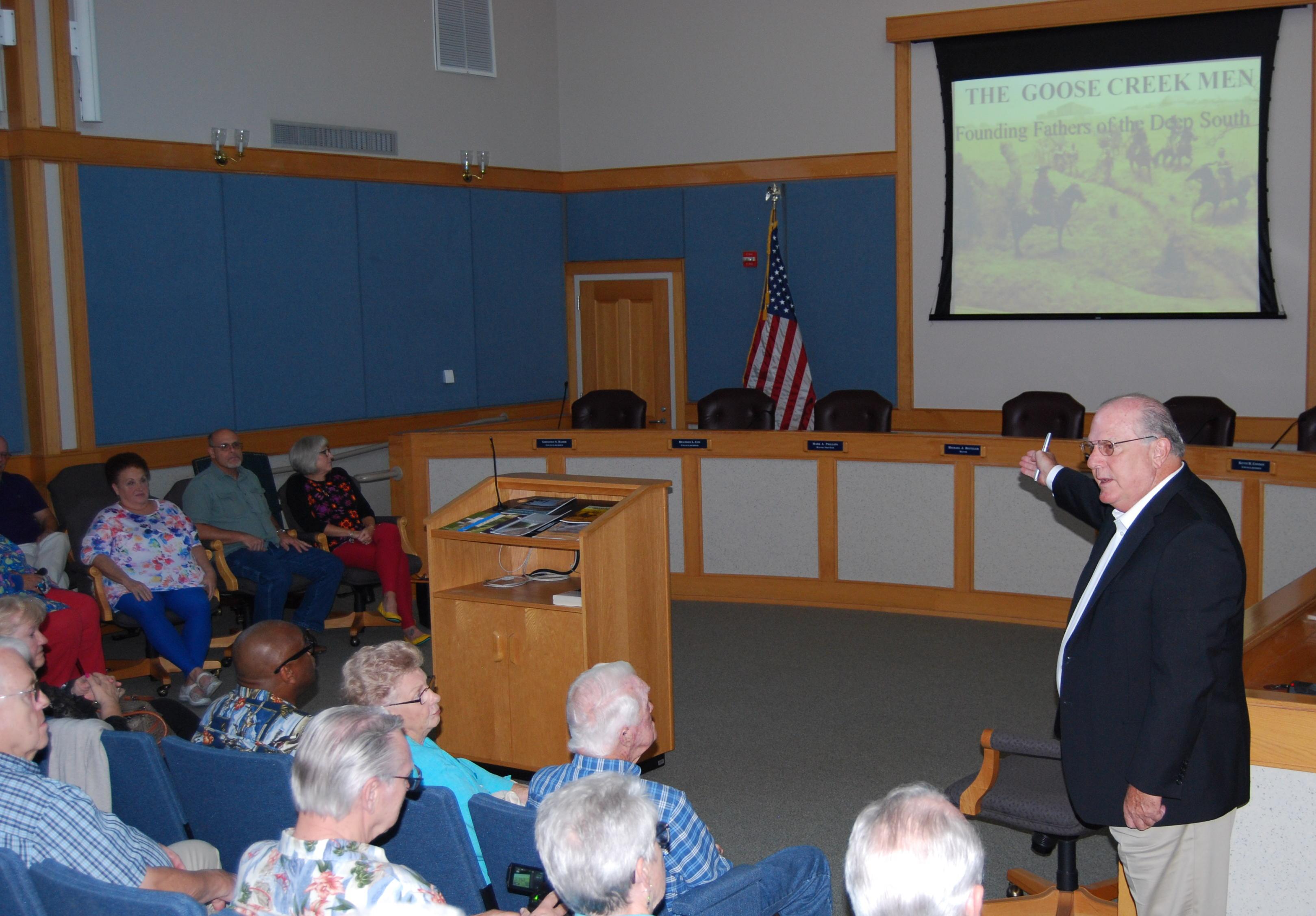 Above, Mayor Heitzler addresses his audience at the Oct. 13 lecture.