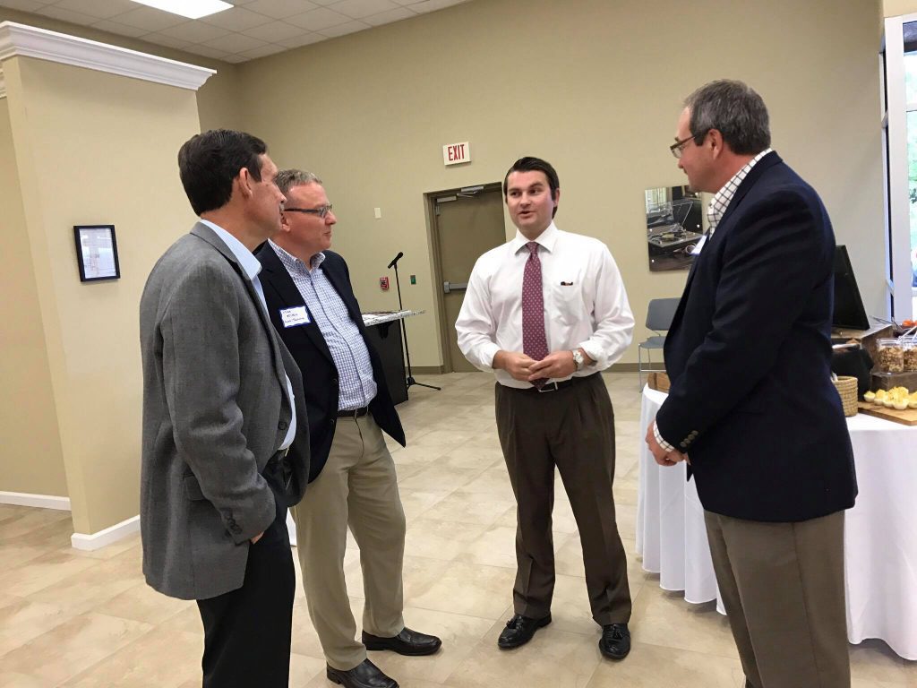 audio-technica officials meet with a South Carolina State Ports Authority representative. The company says SCSPA was instrumental in their choice to expand in Berkeley County.