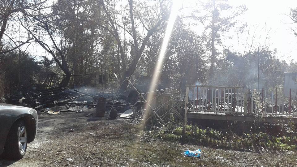 Pictured: What's left of Julie's St. Stephen home after a fire destroyed it.